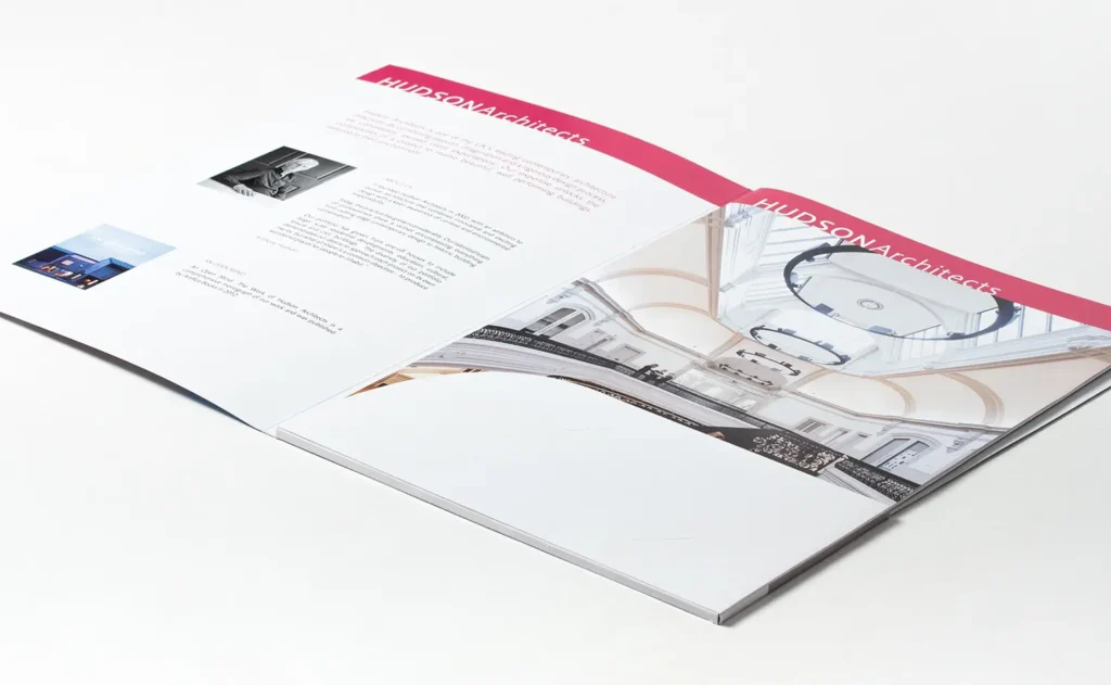 Photograph of the inside of the brochure showing the internal booklets contained within the cover.