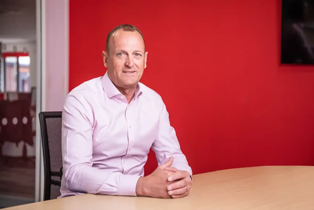 Commercial profile picture of a chief executive officer of a financial services company.