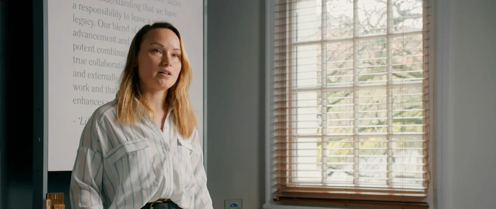 Still of an architect speaking on camera about the LSI Mindplace Wellbeing Index video.