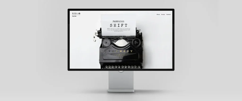 Mockup of a completed website on an Apple Display screen. Project shows the completed FANN2025 website for RIBA Norfolk.